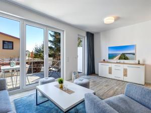 Posezení v ubytování Bernsteinquartier BQ 09a - Ferienhaus Meeresrauschen