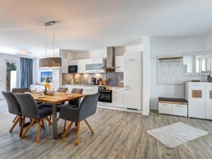 Kuchyň nebo kuchyňský kout v ubytování Bernsteinquartier BQ 09a - Ferienhaus Meeresrauschen