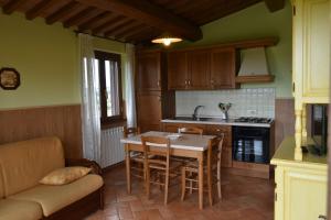 Kuchyň nebo kuchyňský kout v ubytování Agriturismo Le Ginestre