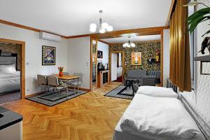 Postel nebo postele na pokoji v ubytování Authentic Apartment hotel