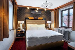 Voodi või voodid majutusasutuse Authentic Apartment hotel toas