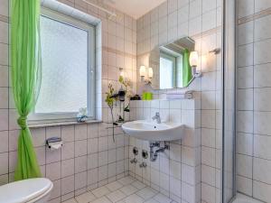 Ein Badezimmer in der Unterkunft Hansehus Ferienwohnung Nr 3