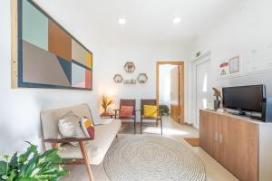 Televisyen dan/atau pusat hiburan di Assenta Beach House - T2