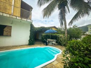 Bazén v ubytování Bapizu Suítes - Ubatuba nebo v jeho okolí