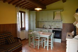 Kuchyň nebo kuchyňský kout v ubytování Agriturismo Le Ginestre