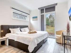 Ένα ή περισσότερα κρεβάτια σε δωμάτιο στο Ferienhaus Karl