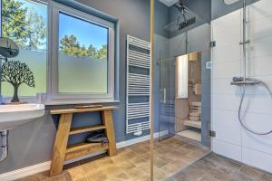 Phòng tắm tại Ferienhaus Lodino Lodge mit Sauna und Kamin +15 ảnh