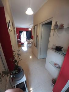 a living room with a hallway with a room with at Deptos de Lili in Termas de Río Hondo