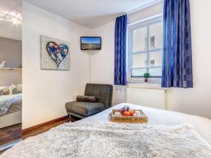 Ein Bett oder Betten in einem Zimmer der Unterkunft Villa Margot - FeWo 02