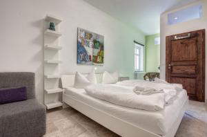 Postel nebo postele na pokoji v ubytování Residenz Bellevue