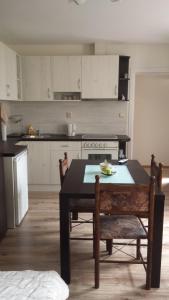 a kitchen with a table with a plate on it at Studio Stonel in Veliko Tŭrnovo