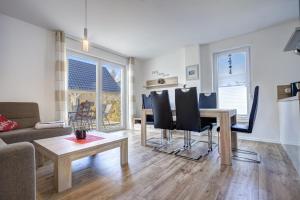 TV a/nebo společenská místnost v ubytování Haus Störtebeker + 26 fotografií