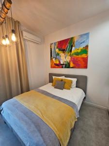 Łóżko lub łóżka w pokoju w obiekcie Ottimo Apartamenty Jagiellońska