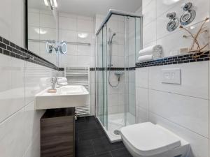 Koupelna v ubytování Residenz am Balmer See - BS 06 mit Wellnessbereich