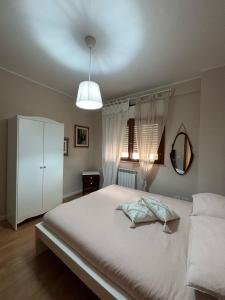 Postel nebo postele na pokoji v ubytování as maison