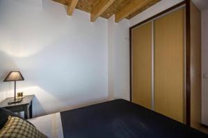 Ein Bett oder Betten in einem Zimmer der Unterkunft Apartamento dos Peixes