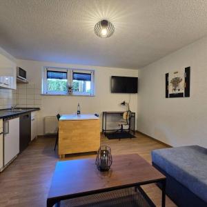 Kuchyň nebo kuchyňský kout v ubytování Kleine Souterrainwohnung in Löhne-Bad Oeynhausen