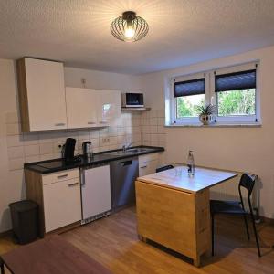 Kuchyň nebo kuchyňský kout v ubytování Kleine Souterrainwohnung in Löhne-Bad Oeynhausen