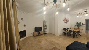 TV a/nebo společenská místnost v ubytování Fabuloso Apartamento