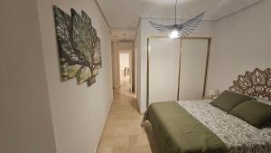 Postel nebo postele na pokoji v ubytování Fabuloso Apartamento