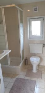 Ένα μπάνιο στο Vakantiewoning Klein Eikenhorst