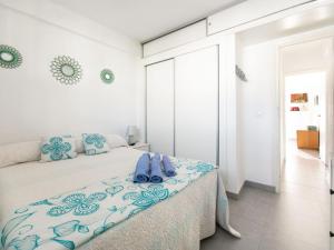 En eller flere senge i et værelse på Apartment Florida by Interhome