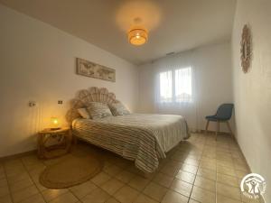 Ένα ή περισσότερα κρεβάτια σε δωμάτιο στο Villa l'ESTIMADA