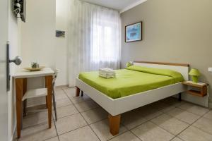 Postel nebo postele na pokoji v ubytování B&B Belvedere