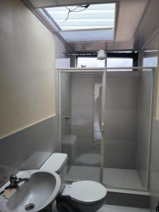 Koupelna v ubytování Departamentos Amoblados
