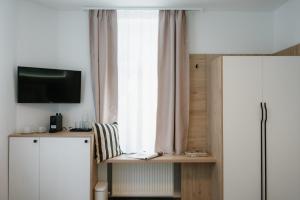 Kuchyň nebo kuchyňský kout v ubytování Black Habit Accomodation