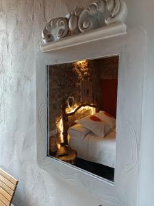 Postel nebo postele na pokoji v ubytování Casa Rustic Suites, JACUZI & LOVE