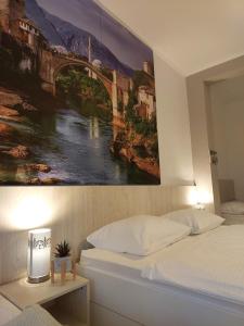 Postel nebo postele na pokoji v ubytování Guest House Vanja