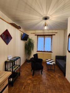Χώρος καθιστικού στο Chez Sandrine au Creux Chêne
