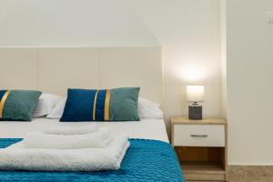 A bed or beds in a room at Vasiliki house