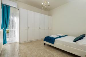 A bed or beds in a room at Vasiliki house