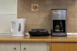 A kitchen or kitchenette at Vasiliki house