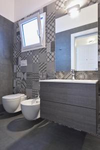 Ett badrum på Tenuta il Bosco