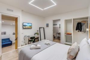 Letto o letti in una camera di Caravita Rooms