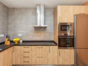 Kuchyň nebo kuchyňský kout v ubytování Holiday Home Esteva by Interhome