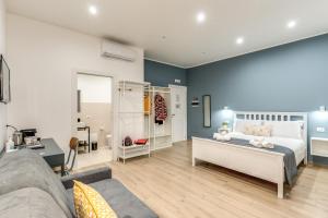 Letto o letti in una camera di Caravita Rooms