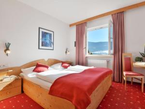 Postel nebo postele na pokoji v ubytování Apartment Residence Egger - n-102 by Interhome