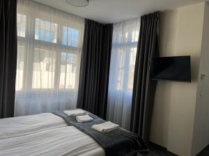 Villa Neos客房内的一张或多张床位