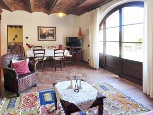 a living room with a table and a dining room at Holiday Home Linearis J by Interhome in SantʼAppiano +22 photos