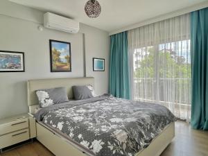 Postel nebo postele na pokoji v ubytování Deniz Manzaralı, Plaja 100 Metre, Luks Daire 3