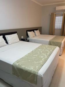 Postel nebo postele na pokoji v ubytování Hotel Uipi + 27 fotografií
