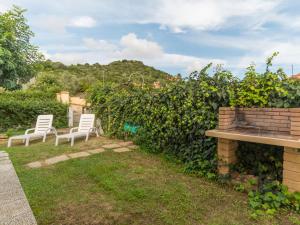 Κήπος έξω από το Holiday Home Case Stelle Marine - REI217 by Interhome