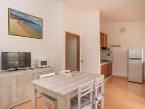 Η κουζίνα ή μικρή κουζίνα στο Holiday Home Case Stelle Marine - REI217 by Interhome