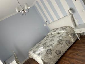 Postel nebo postele na pokoji v ubytování B&B La Vigna