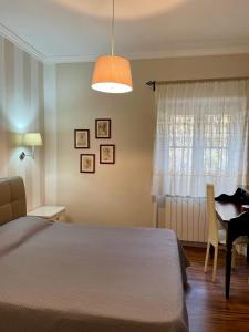 Postel nebo postele na pokoji v ubytování B&B La Vigna