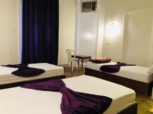Llit o llits en una habitació de Mesho Cairo Hostel
